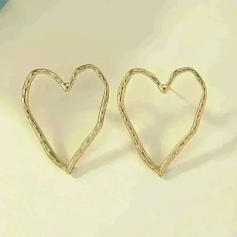 Hollow Heart Shaped Stud Earrings - Picture 4 of 5